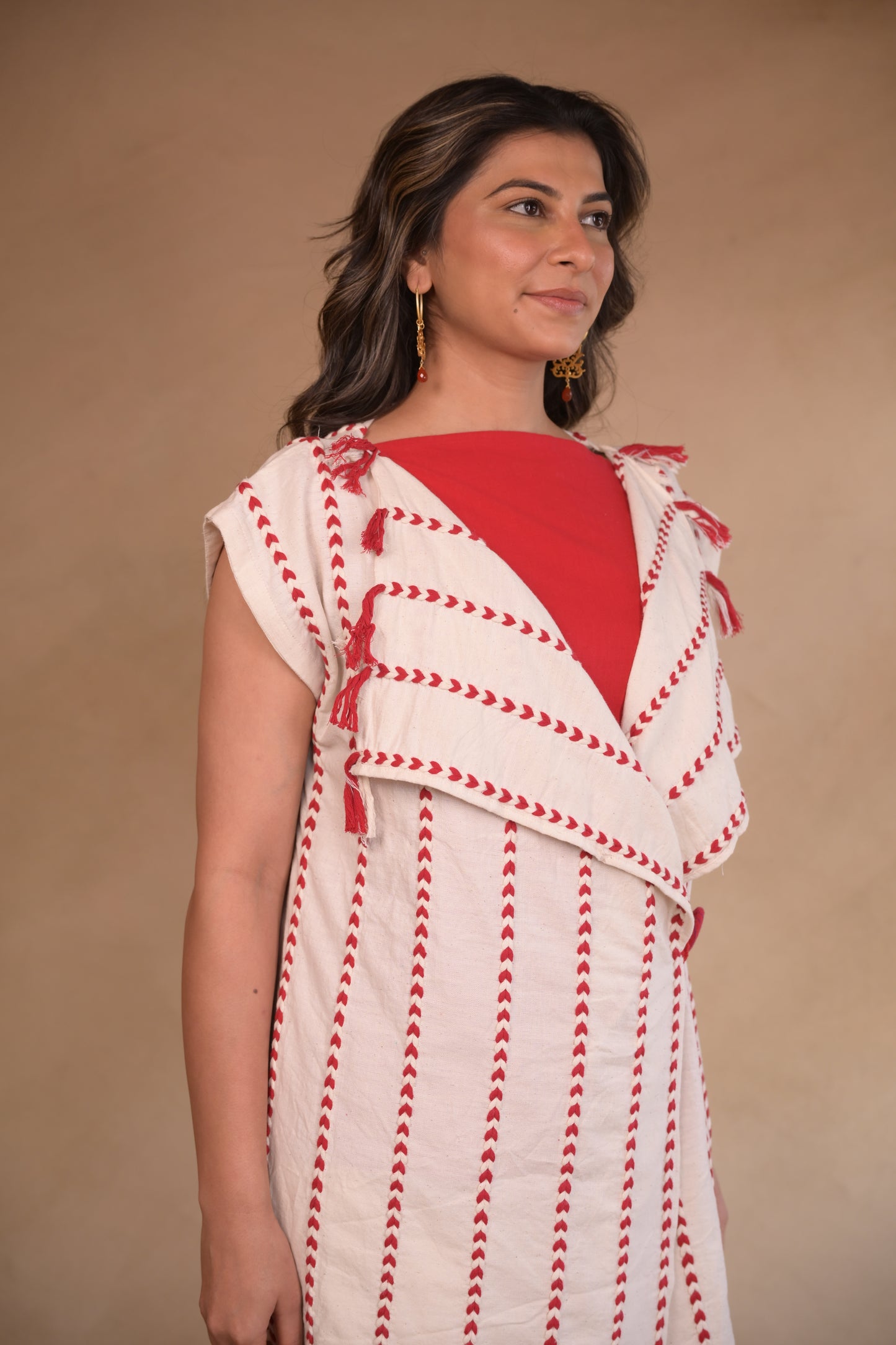 Jacket, woven with Miri detail and tassels with focus button