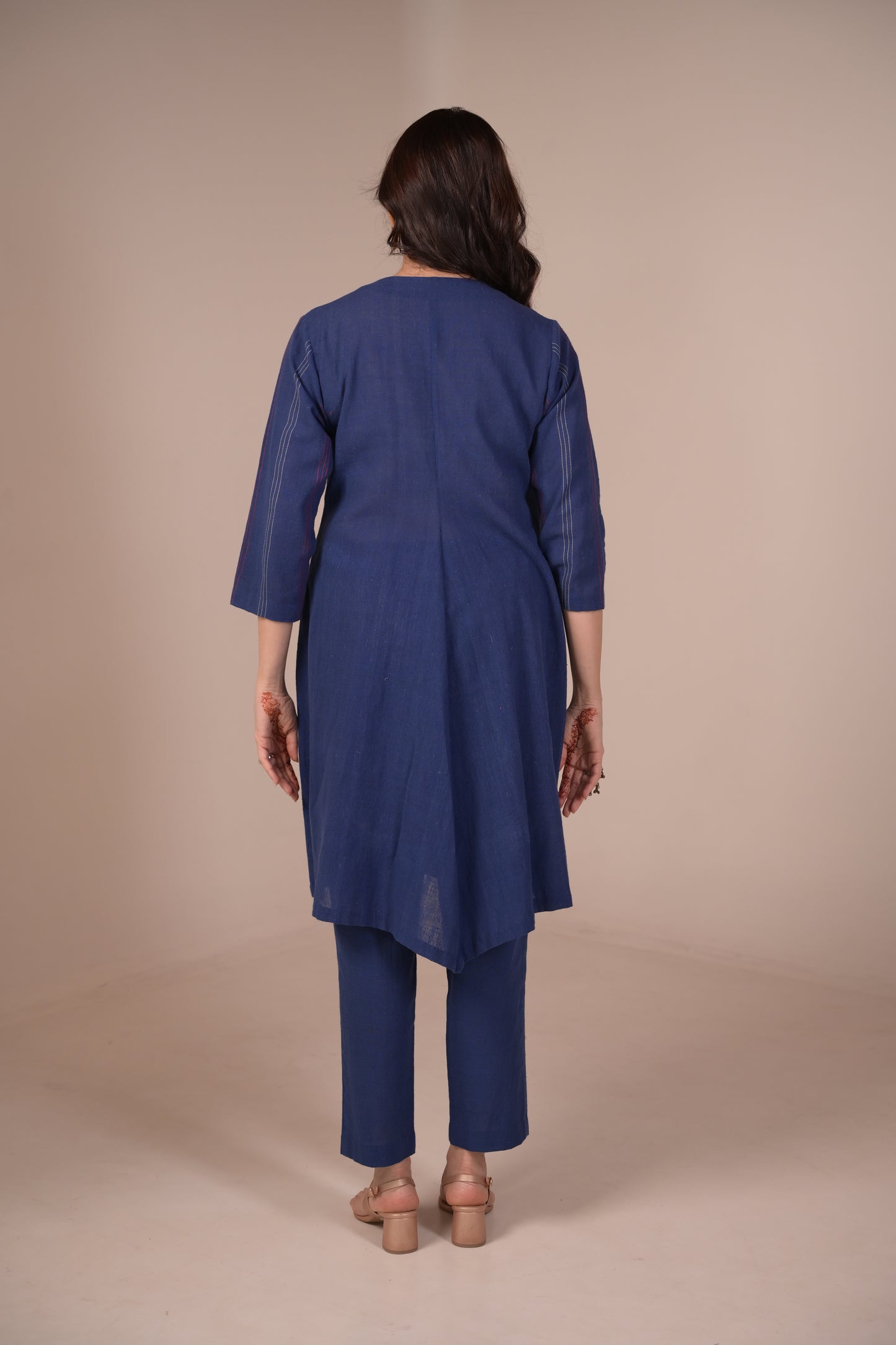Tunic, Jacket style with Pleated texture detail and Hand embroidered button