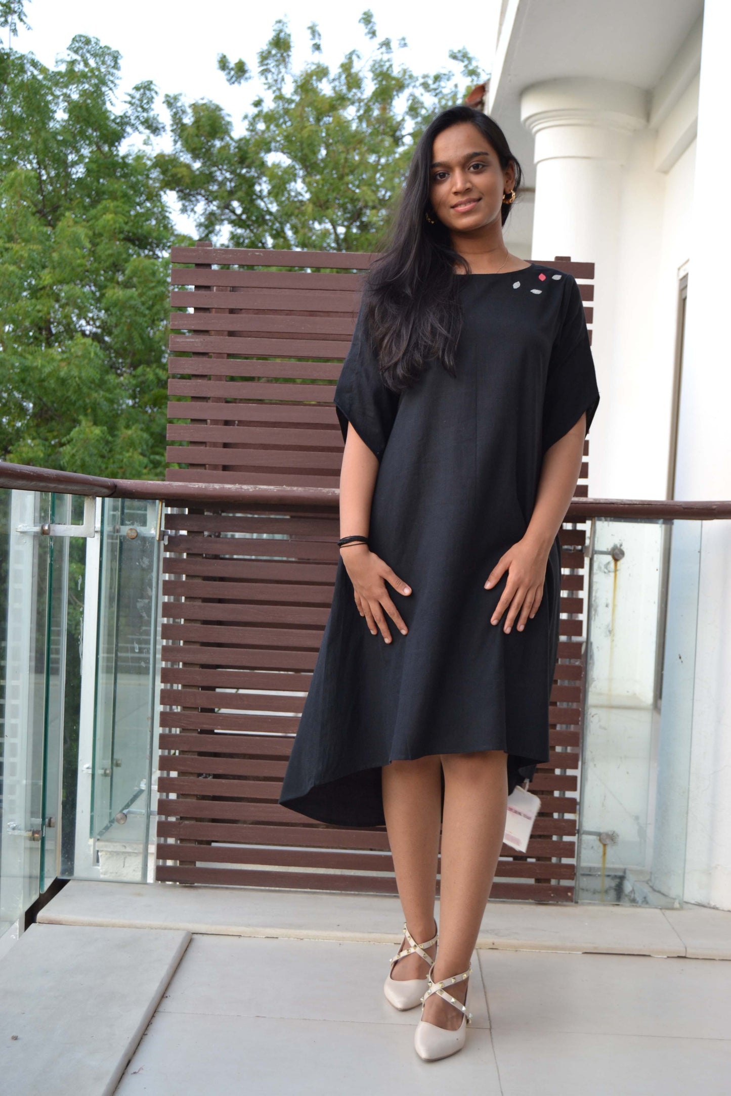 Assymetric dress with patch work
detail