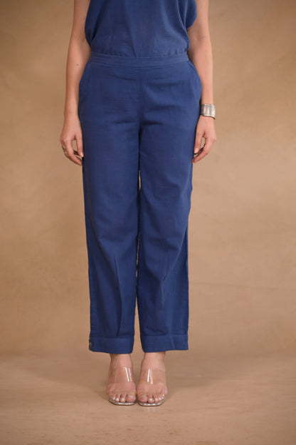 Pant, in pleat and button detail at hem