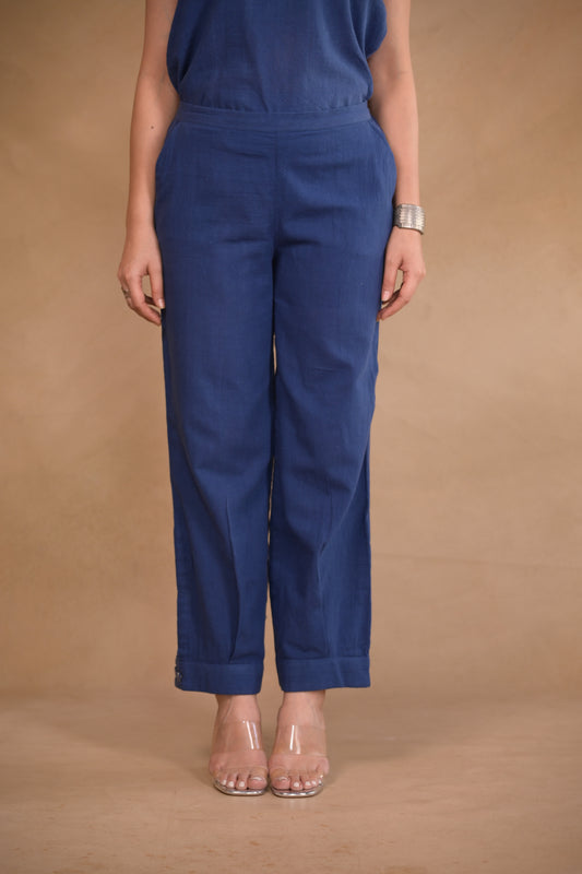Pant, in pleat and button detail at hem