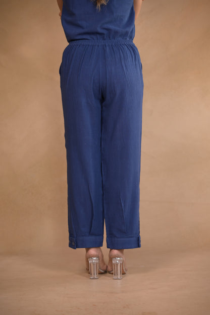 Pant, in pleat and button detail at hem